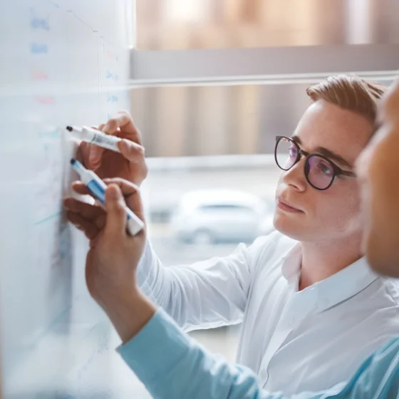 business people thinking outside the box
